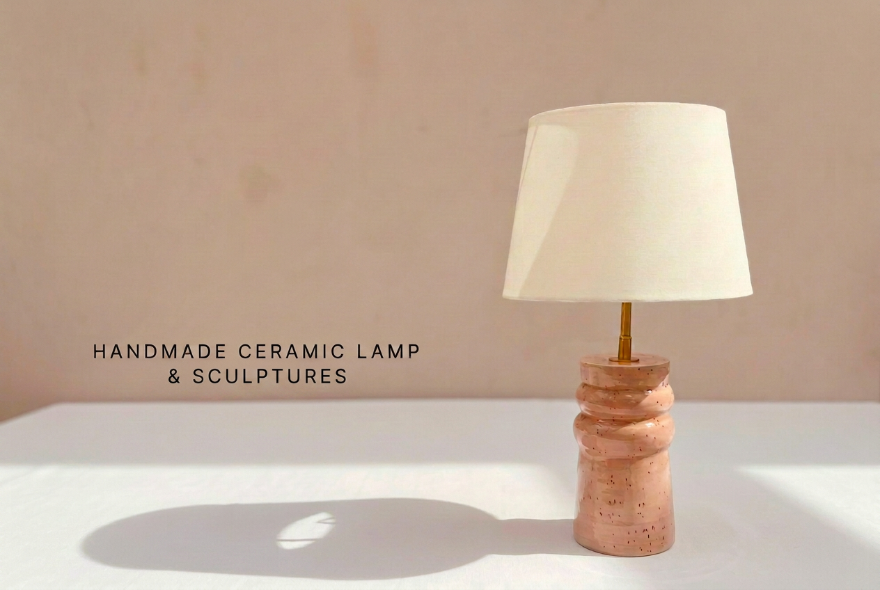 Handmade ceramic light in a pale plaster room